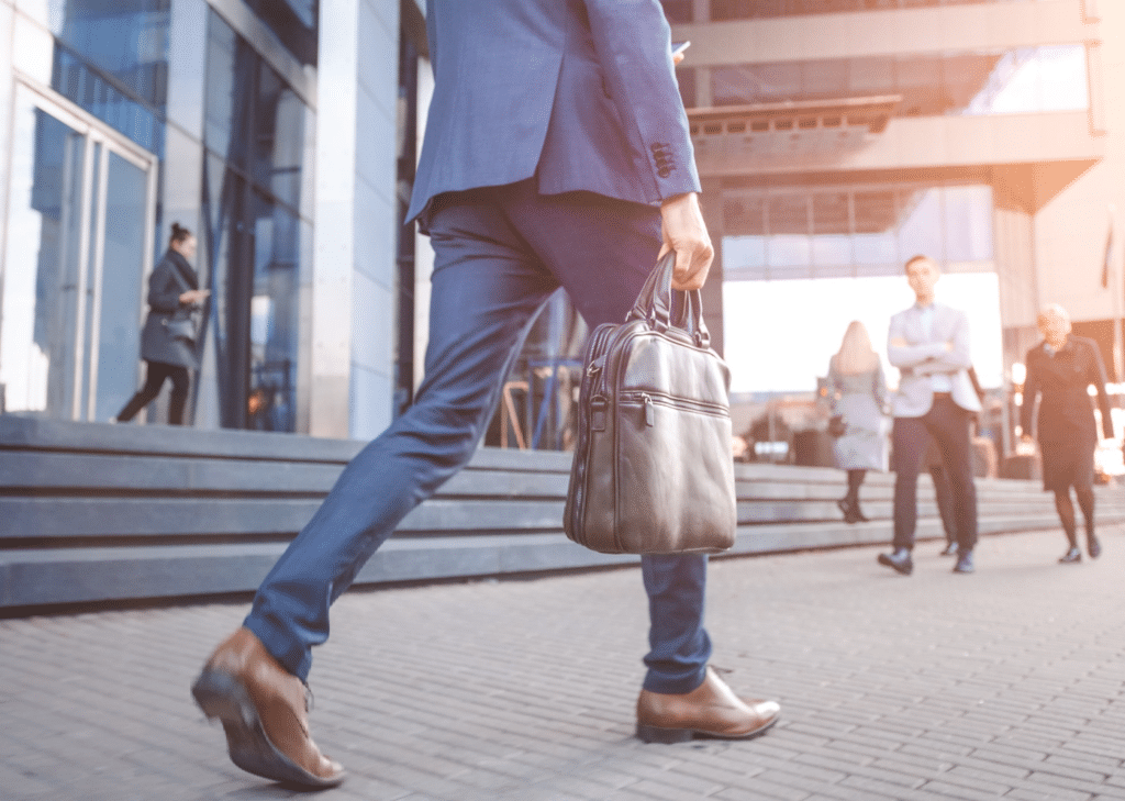Business Man Walking With Messenger Bag